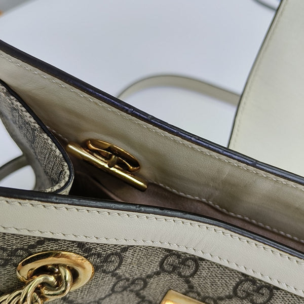 Padlock Small Monogram Coated Canvas Beige