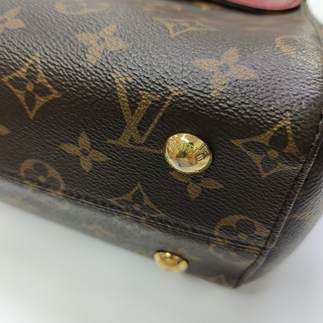 VÉNUS Monogram Coated Canvas Brown