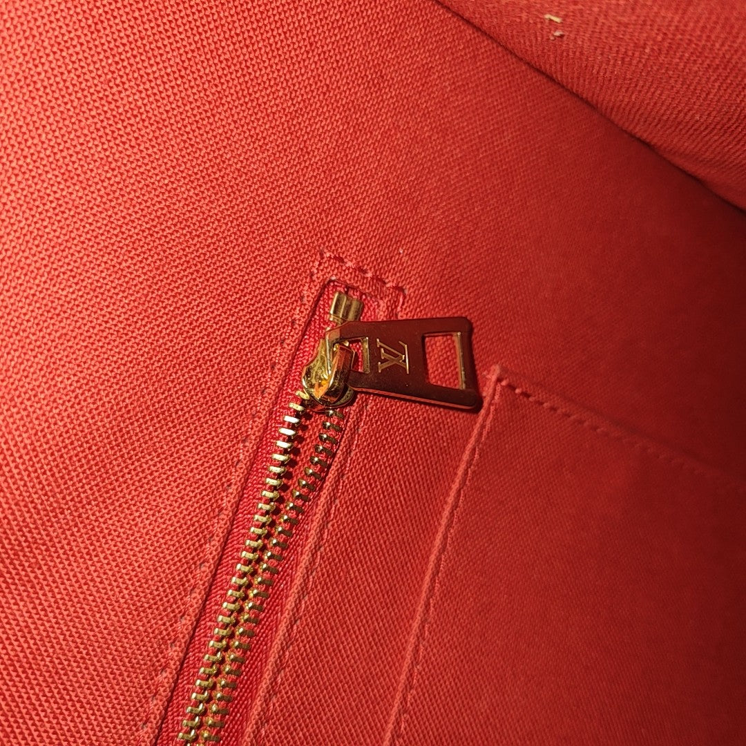 ONTHEGO MM Monogram Coated Canvas Brown