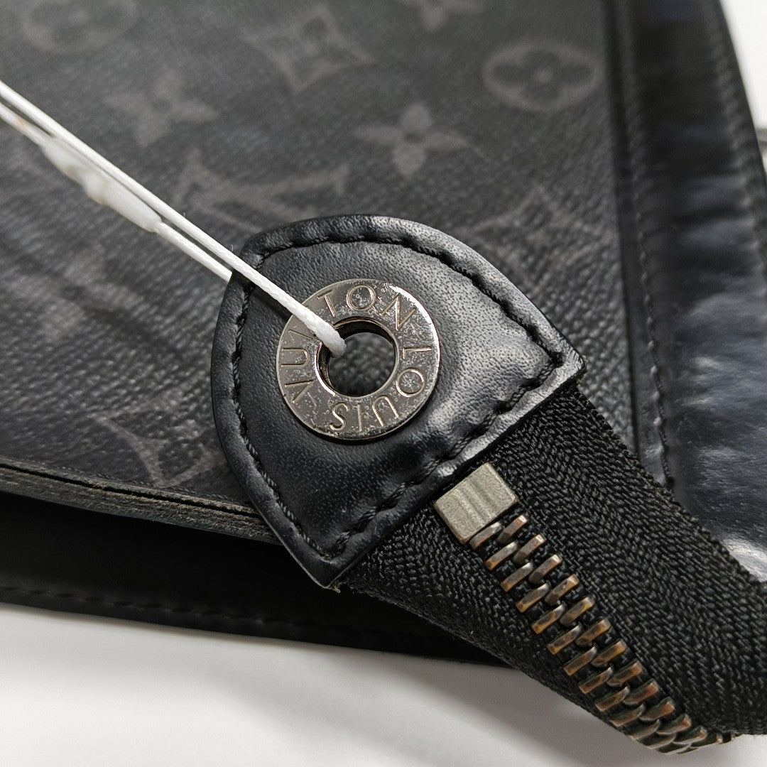 Pochette Voyag MM Monogram Coated Canvas Black