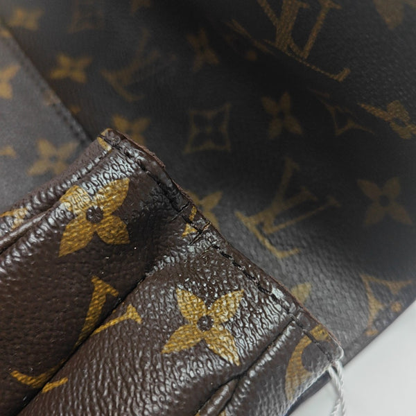 MÉTIS MM Monogram Coated Canvas Brown
