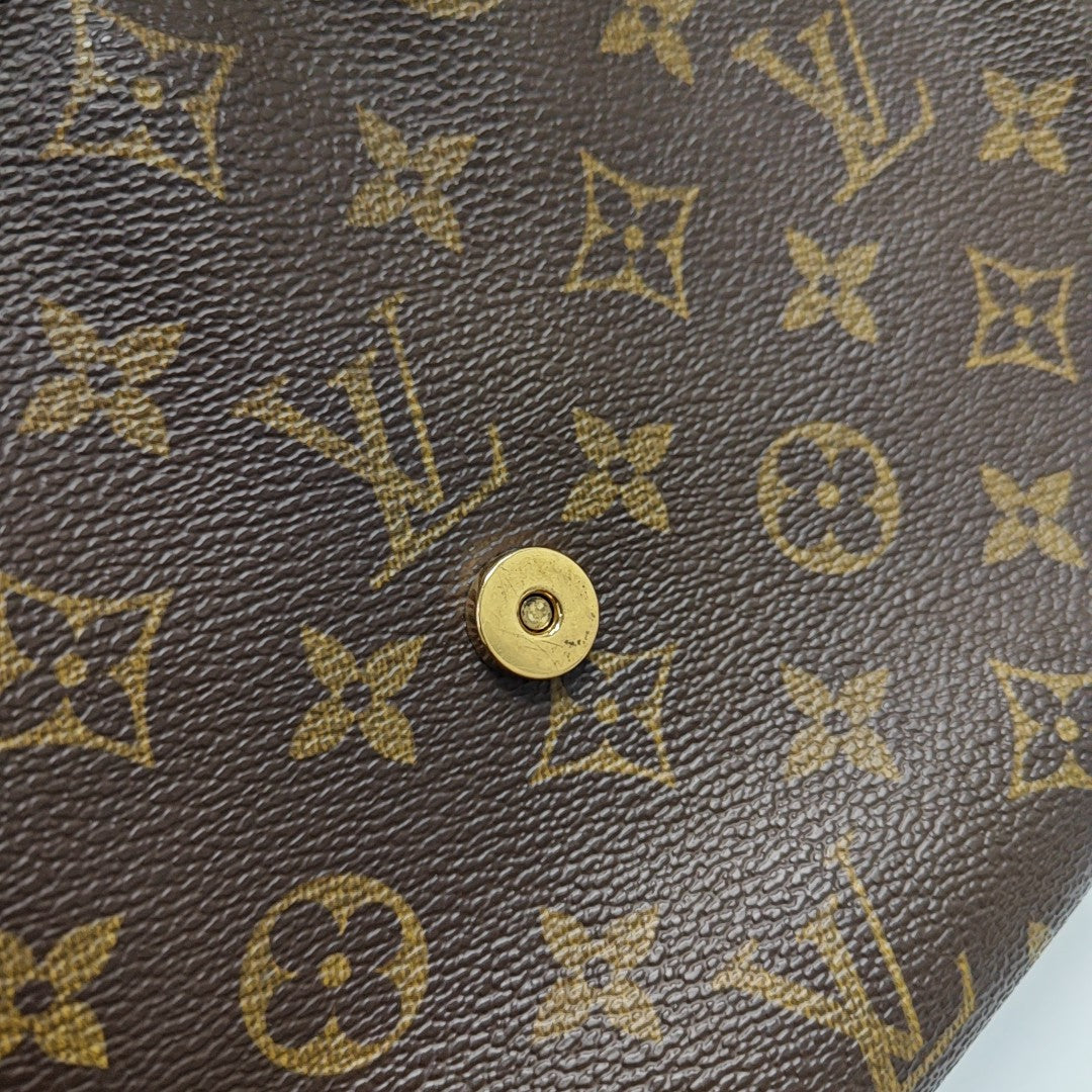 LOOPING PM Monogram Coated Canvas Brown