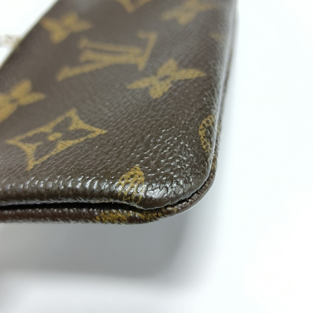 Monogram Coated Canvas Clutch Brown