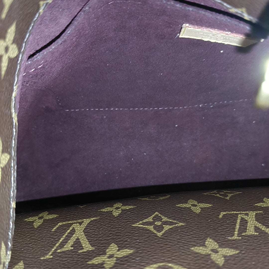 MONTAIGNE GM Monogram Coated Canvas Brown