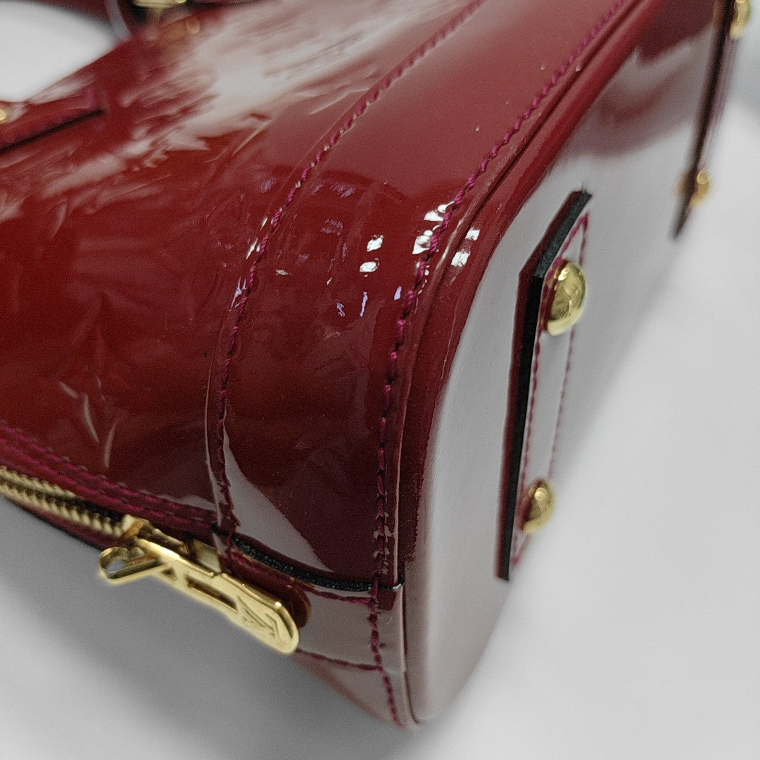 ALMA BB Monogram Patent Leather Red