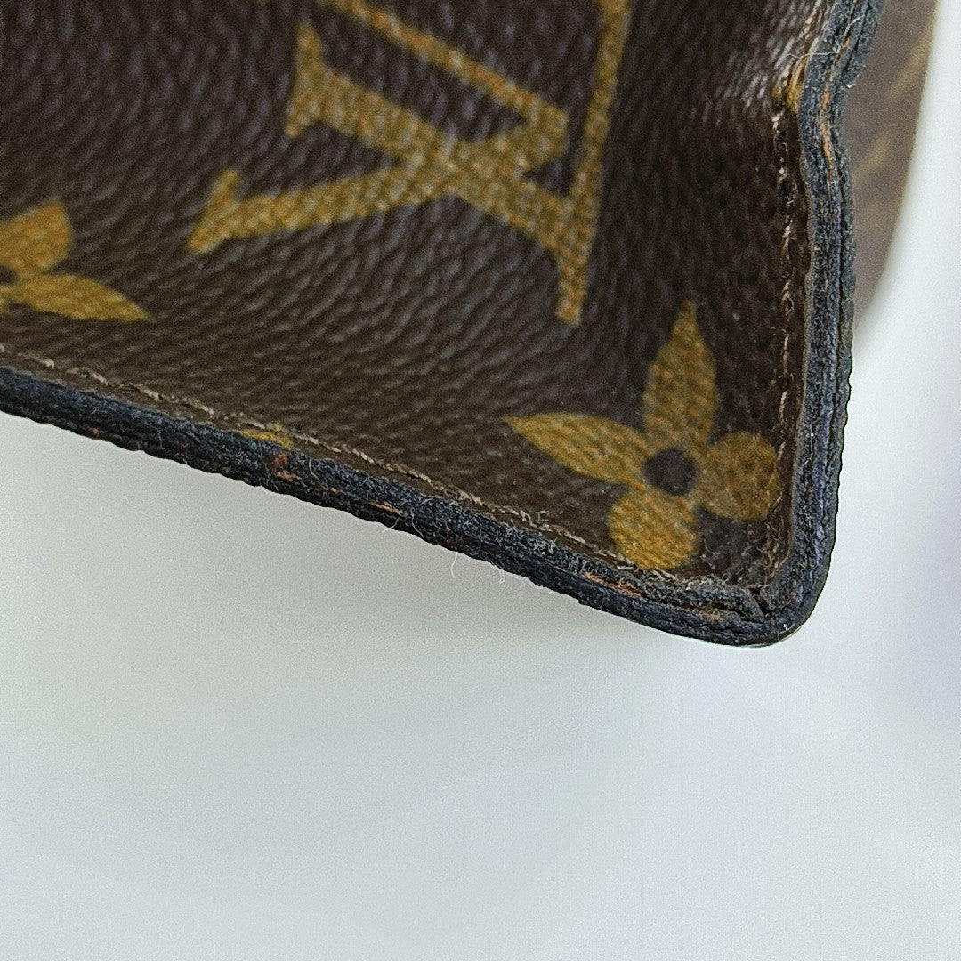TOILET POCKET Monogram Coated Canvas Brown