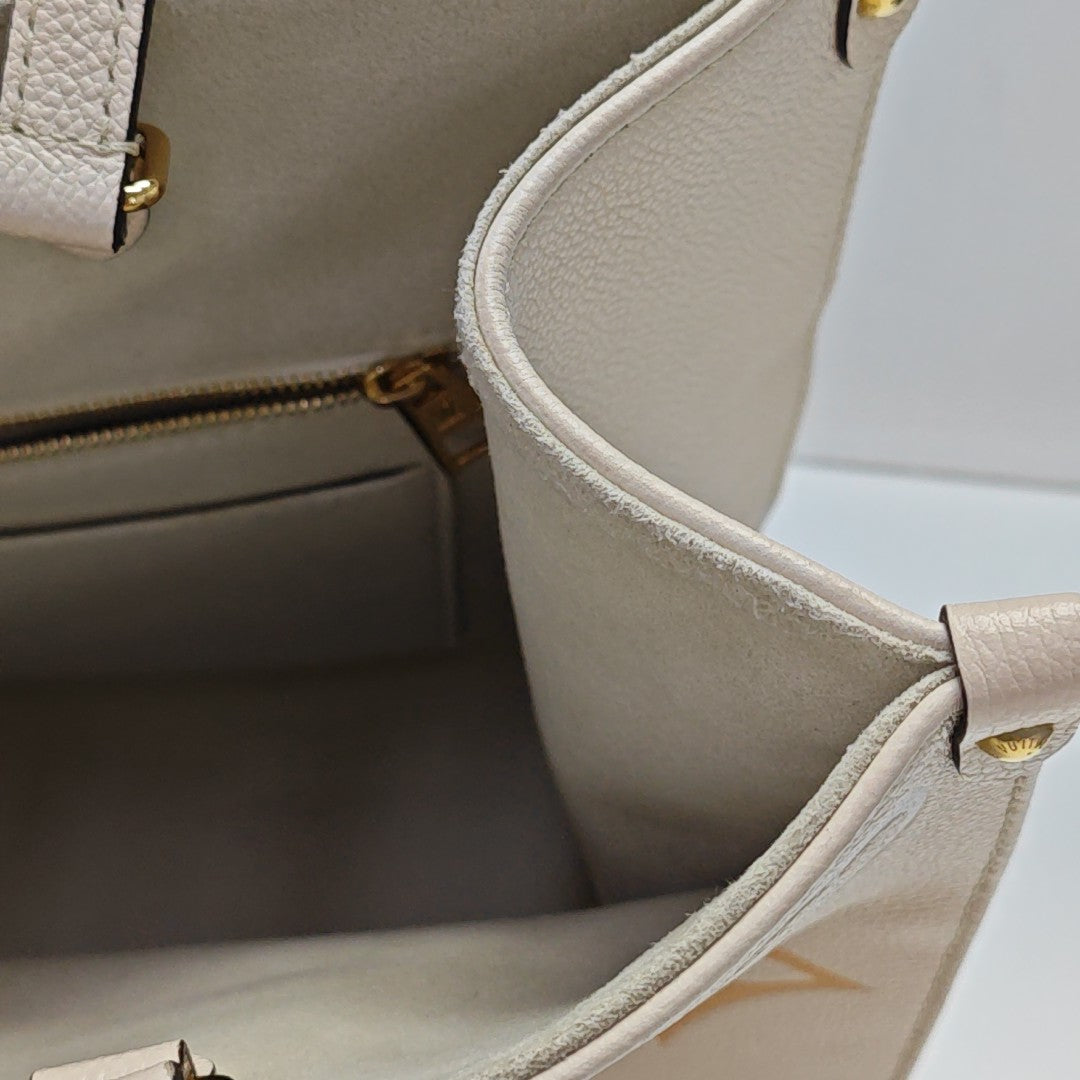 ONTHEGO MM Monogram Calfskin Beige