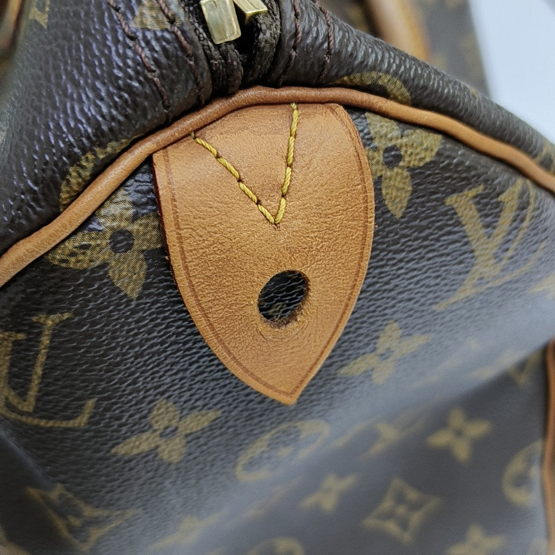 SPEEDY 30 Monogram Coated Canvas Brown