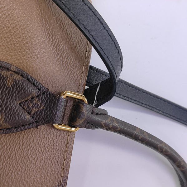 ONTHEGO MM Monogram Coated Canvas Brown