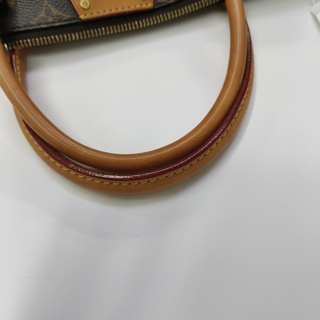 TURENNE MM Monogram Coated Canvas Brown