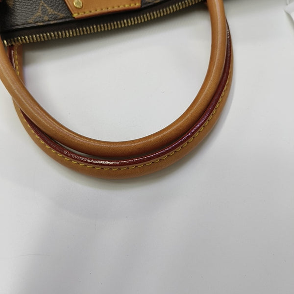 TURENNE MM Monogram Coated Canvas Brown