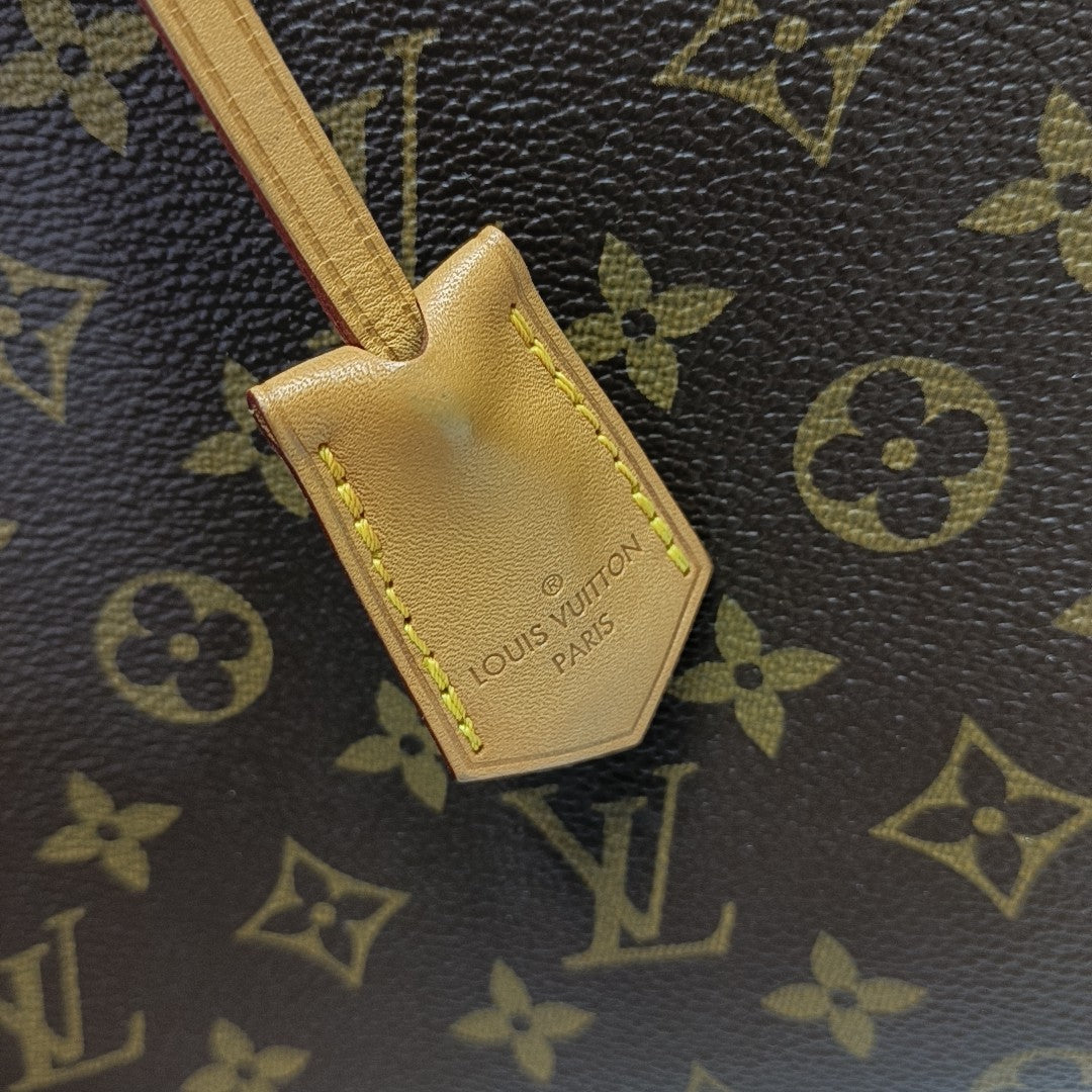 MONTAIGNE GM Monogram Coated Canvas Brown