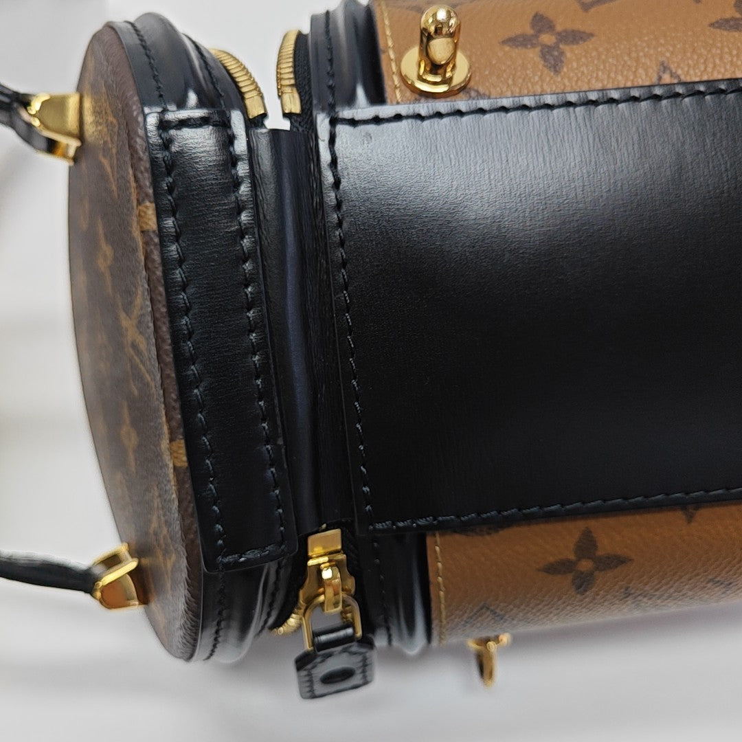 CANNES PM Monogram Coated Canvas Brown
