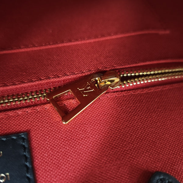 ONTHEGO MM Monogram Coated Canvas Brown