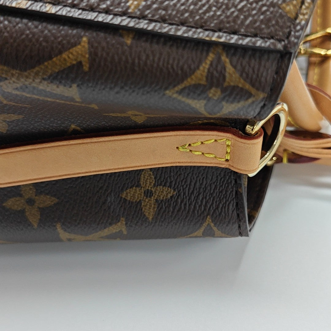 MONTAIGNE Monogram Coated Canvas Brown