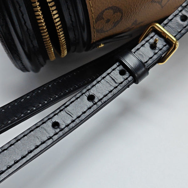 CANNES PM Monogram Coated Canvas Brown