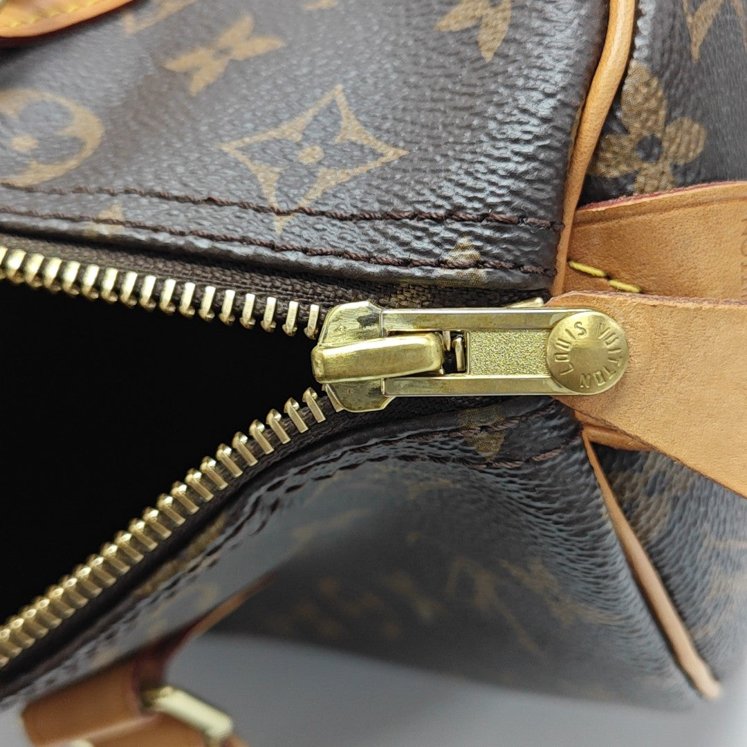 SPEEDY 30 Monogram Coated Canvas Brown