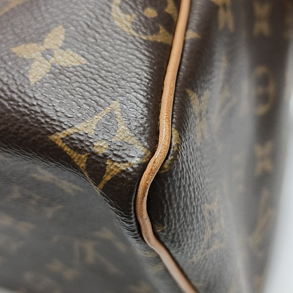 SPEEDY 25 Monogram Coated Canvas Brown