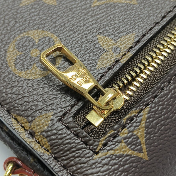 MÉTIS EAST WEST Monogram Coated Canvas Brown