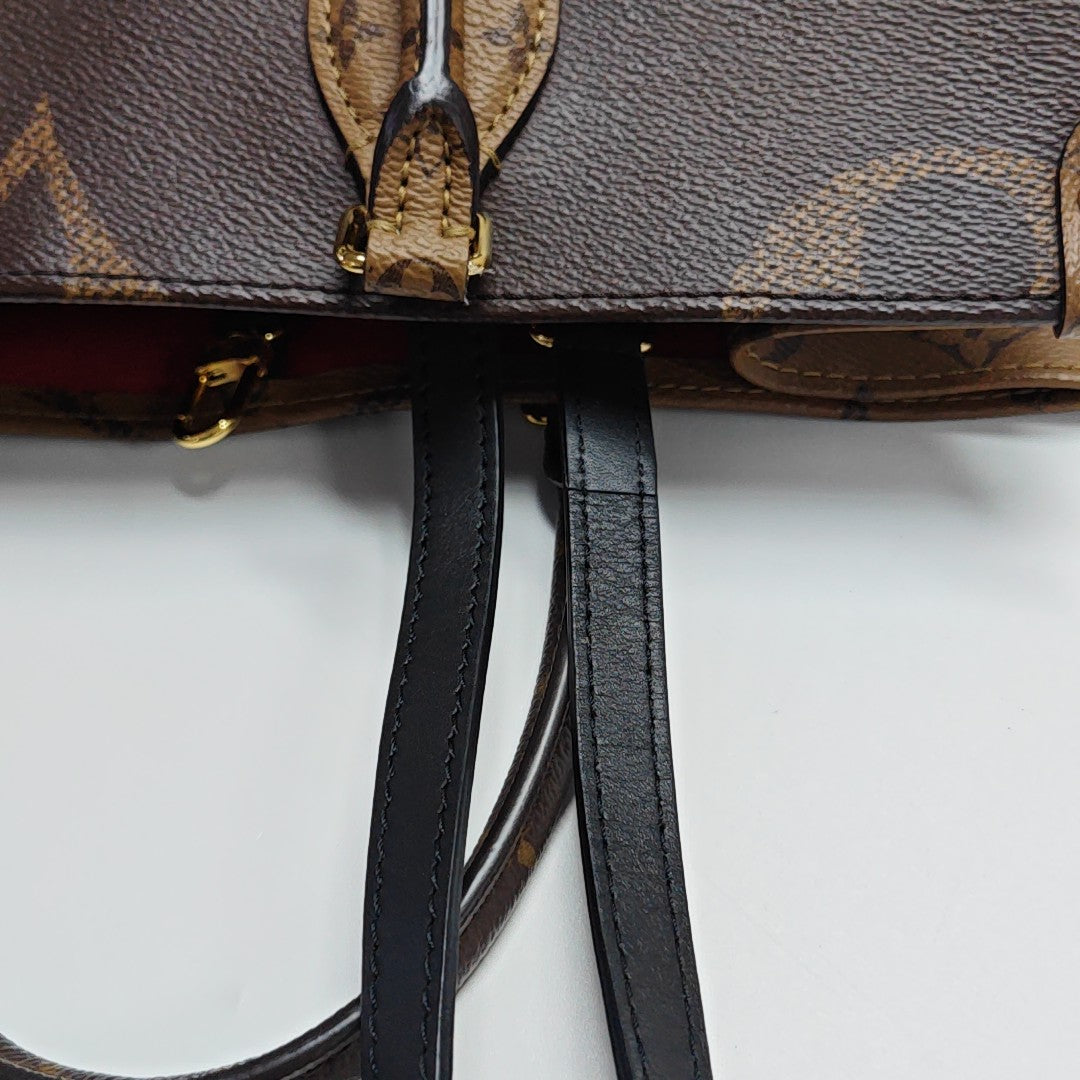 ONTHEGO MM Monogram Coated Canvas Brown