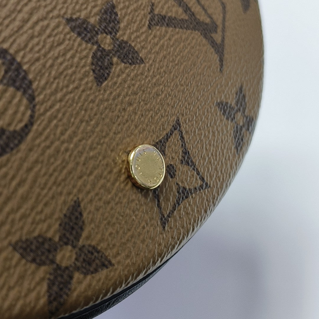CANNES PM Monogram Coated Canvas Brown
