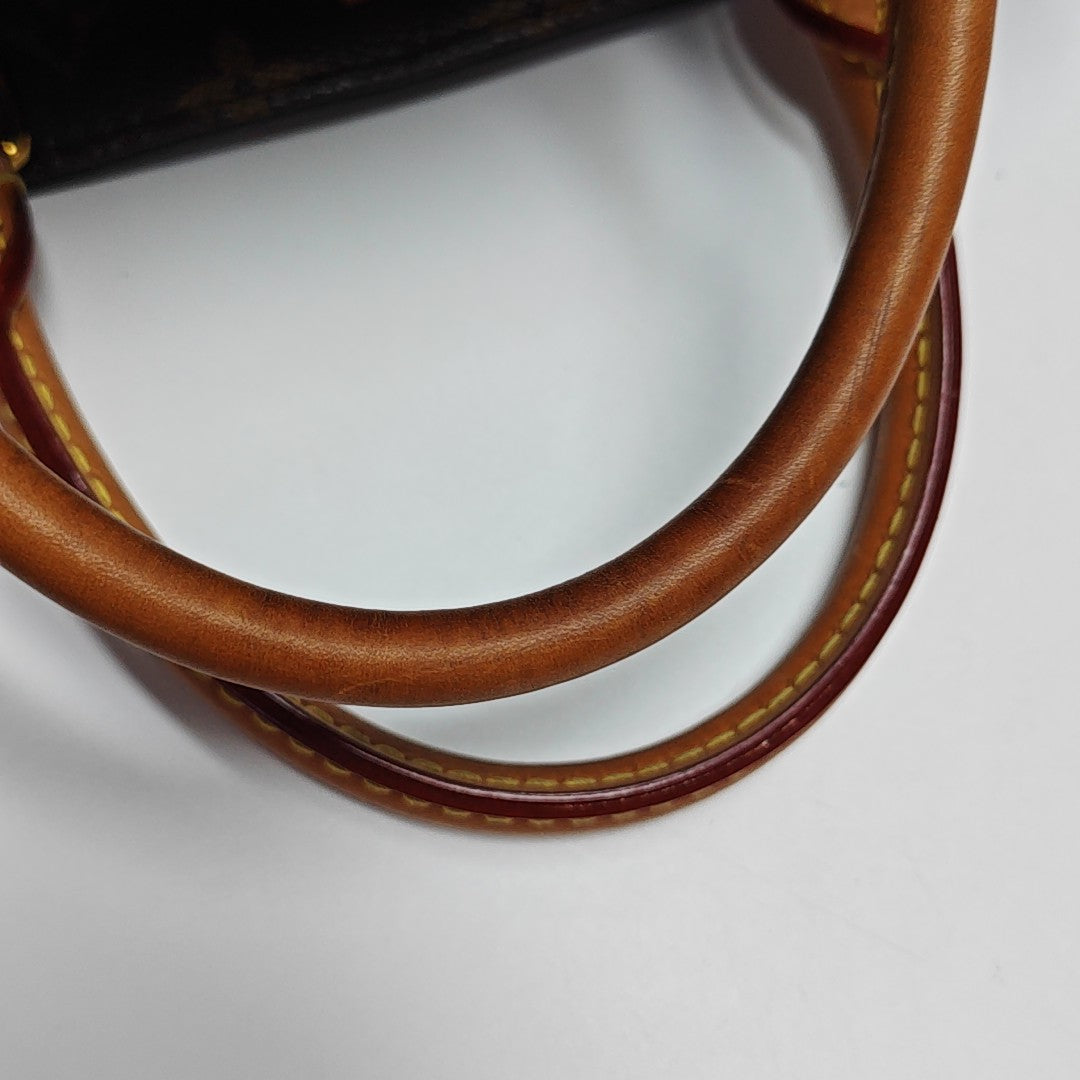 MONTAIGNE Monogram Coated Canvas Brown
