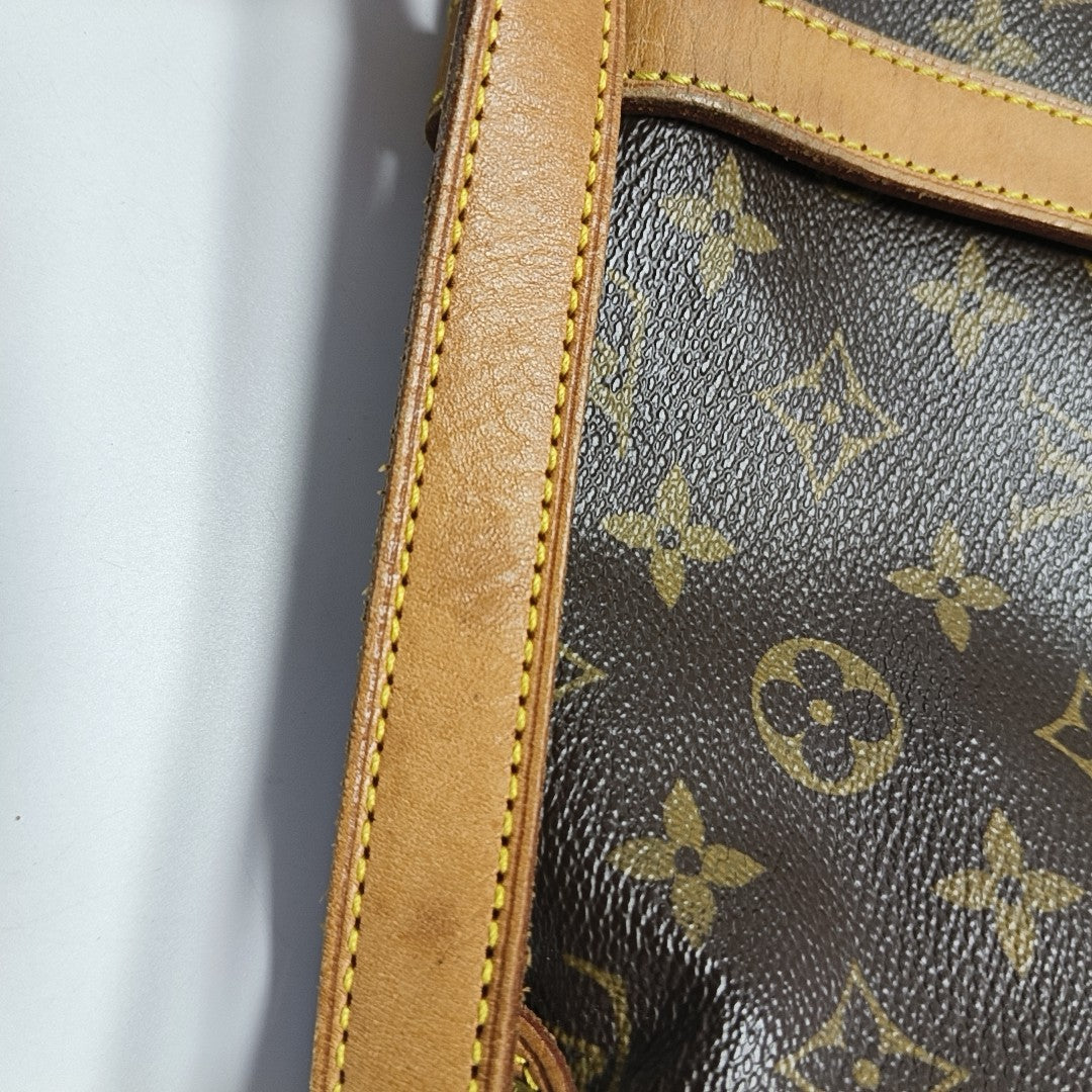 SAUMUR Monogram Coated Canvas Brown