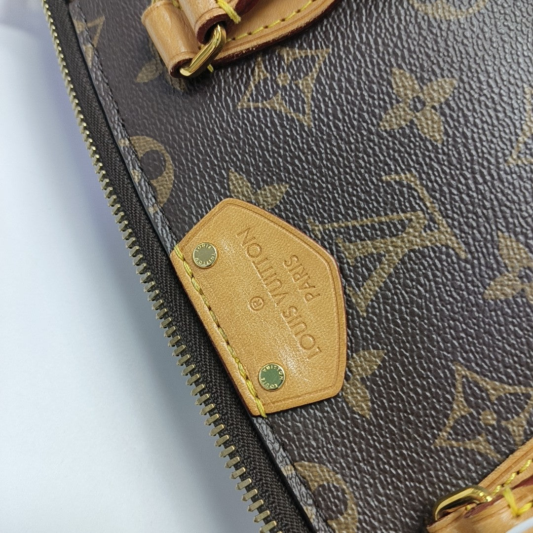 TURENNE Monogram Coated Canvas Brown