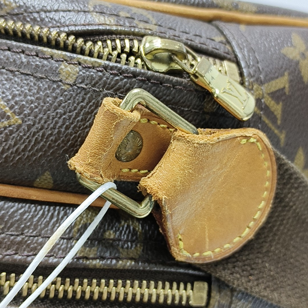 REPORTER Monogram Coated Canvas Brown
