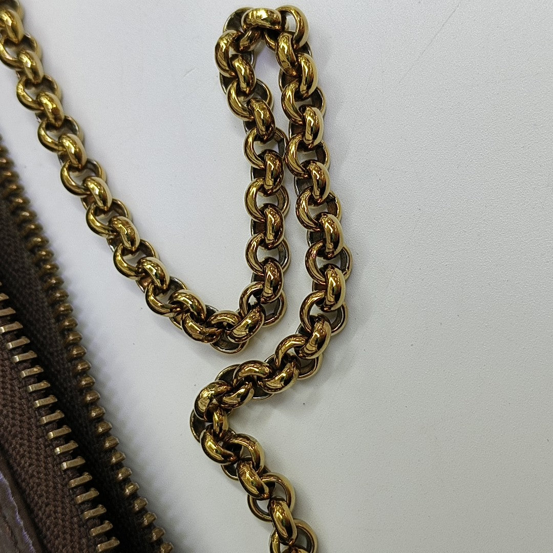 EVA Monogram Coated Canvas Brown