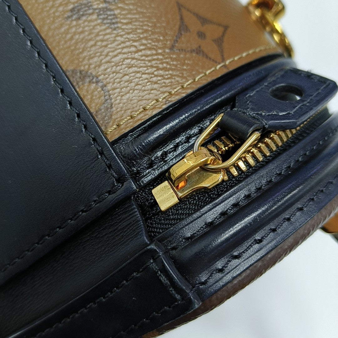CANNES PM Monogram Coated Canvas Brown