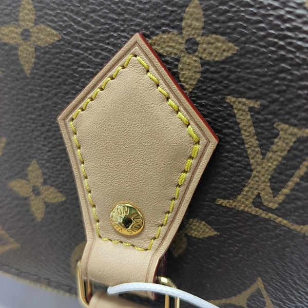 SPEEDY 20 Monogram Coated Canvas Brown