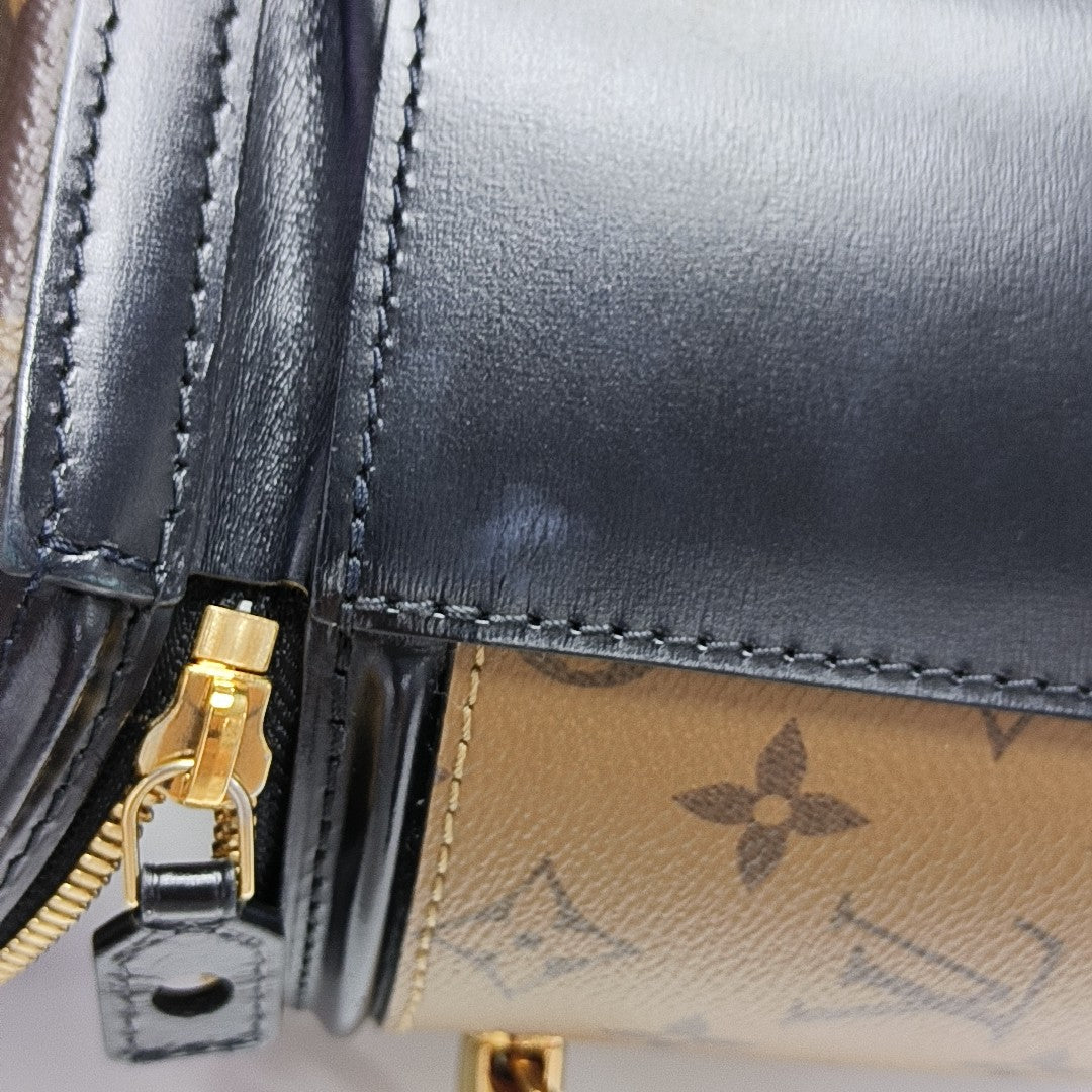 CANNES PM Monogram Coated Canvas Brown