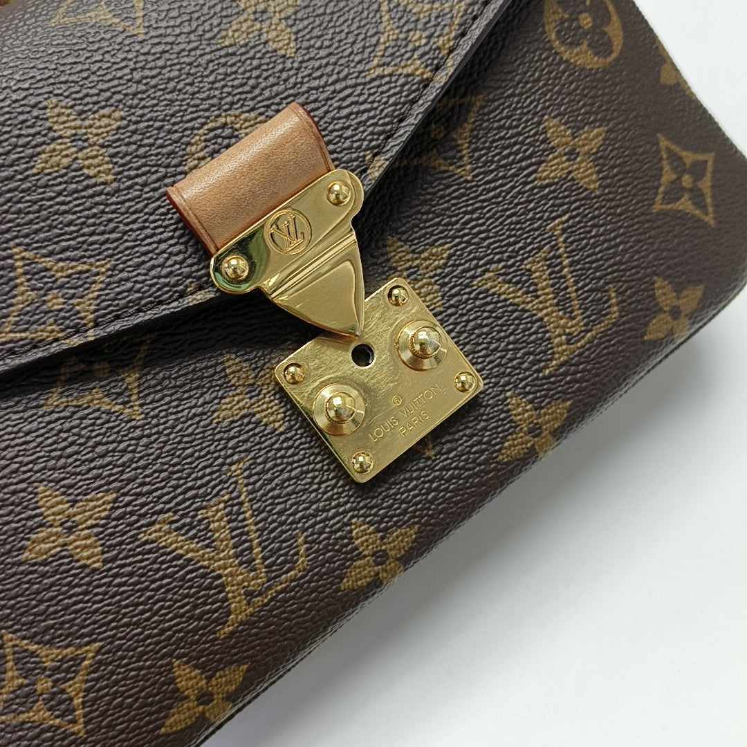 MÉTIS EAST WEST Monogram Coated Canvas Brown