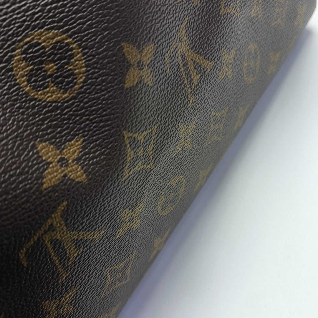 SPEEDY 25 Monogram Coated Canvas Brown