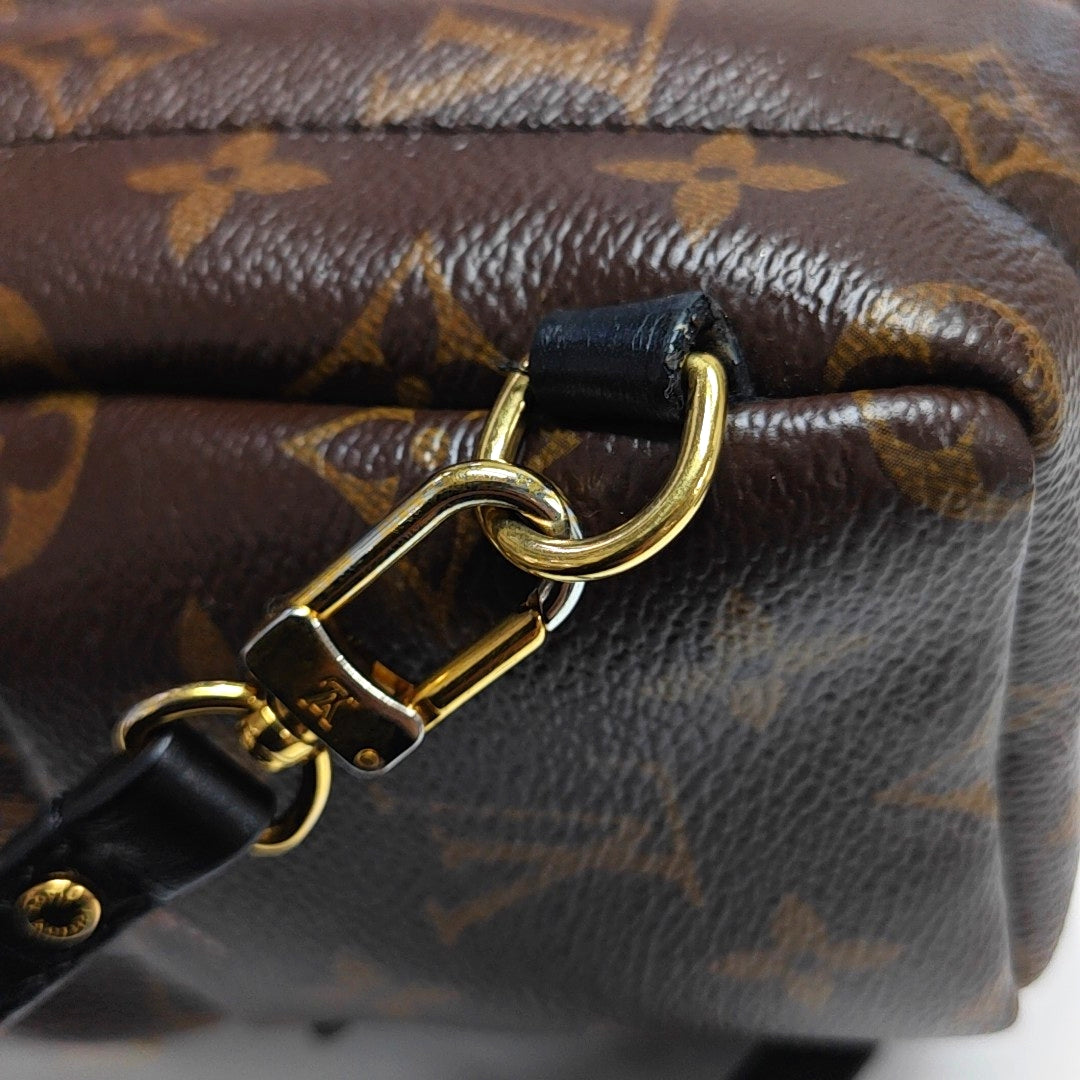 Authenticated pre-owned  PALM SPRINGS Mini Monogram Coated Canvas Brown - Backpack at Looply