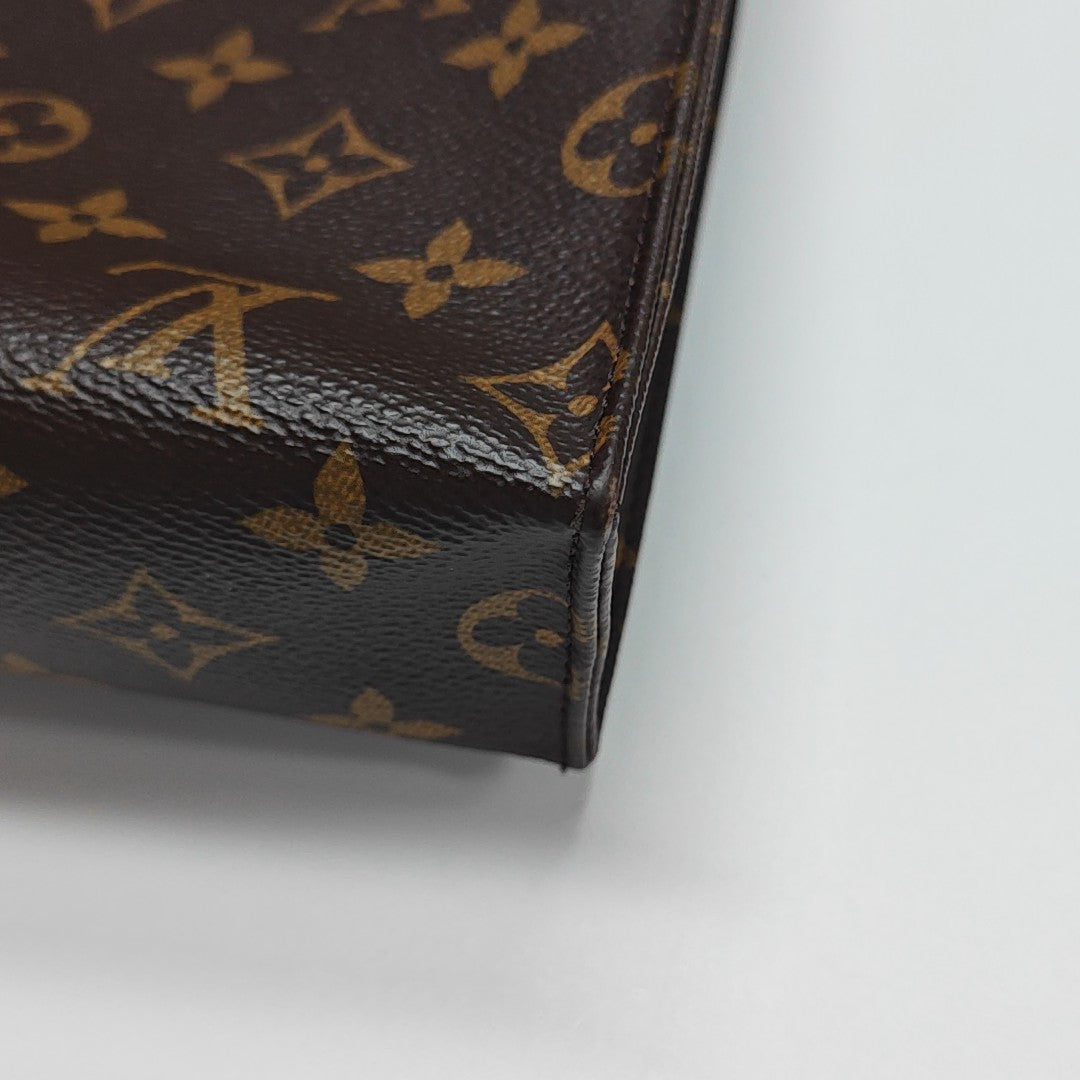TOILET POCKET 26 Monogram Coated Canvas Brown