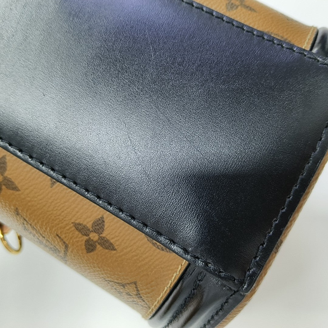 CANNES PM Monogram Coated Canvas Brown