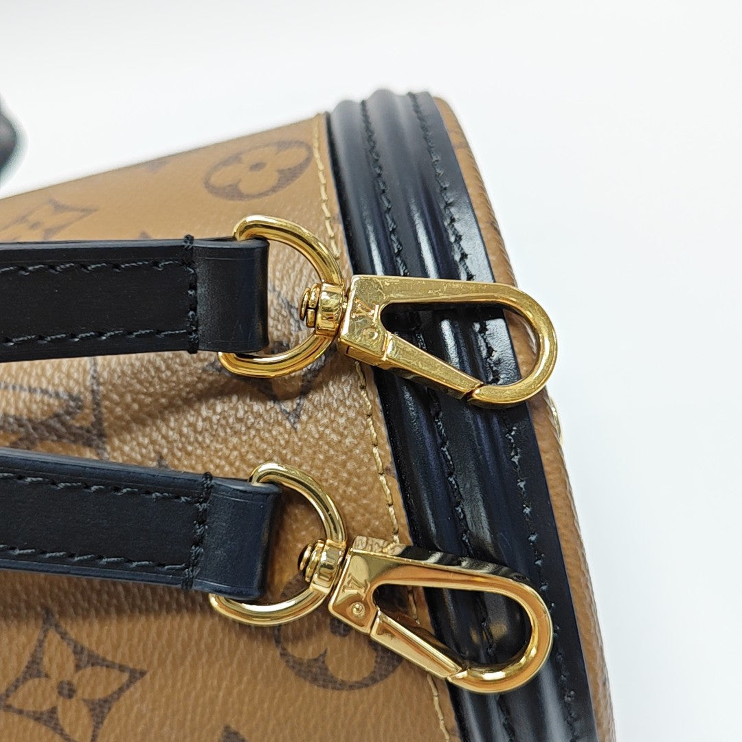 CANNES PM Monogram Coated Canvas Brown