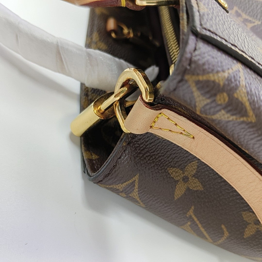 MONTAIGNE Monogram Coated Canvas Brown