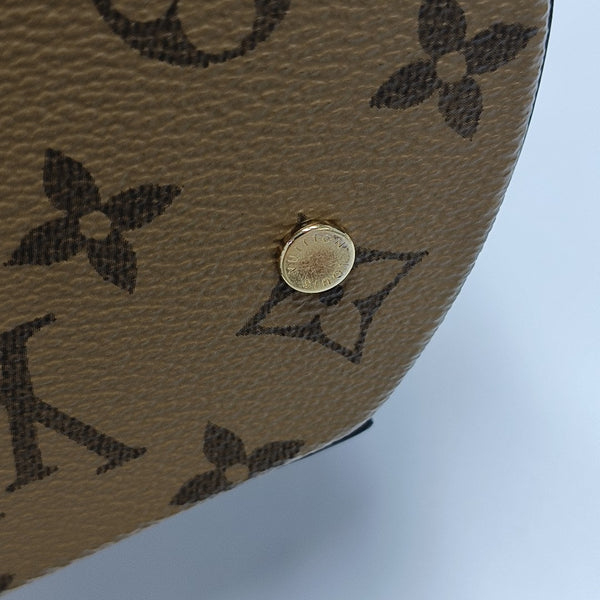 CANNES PM Monogram Coated Canvas Brown