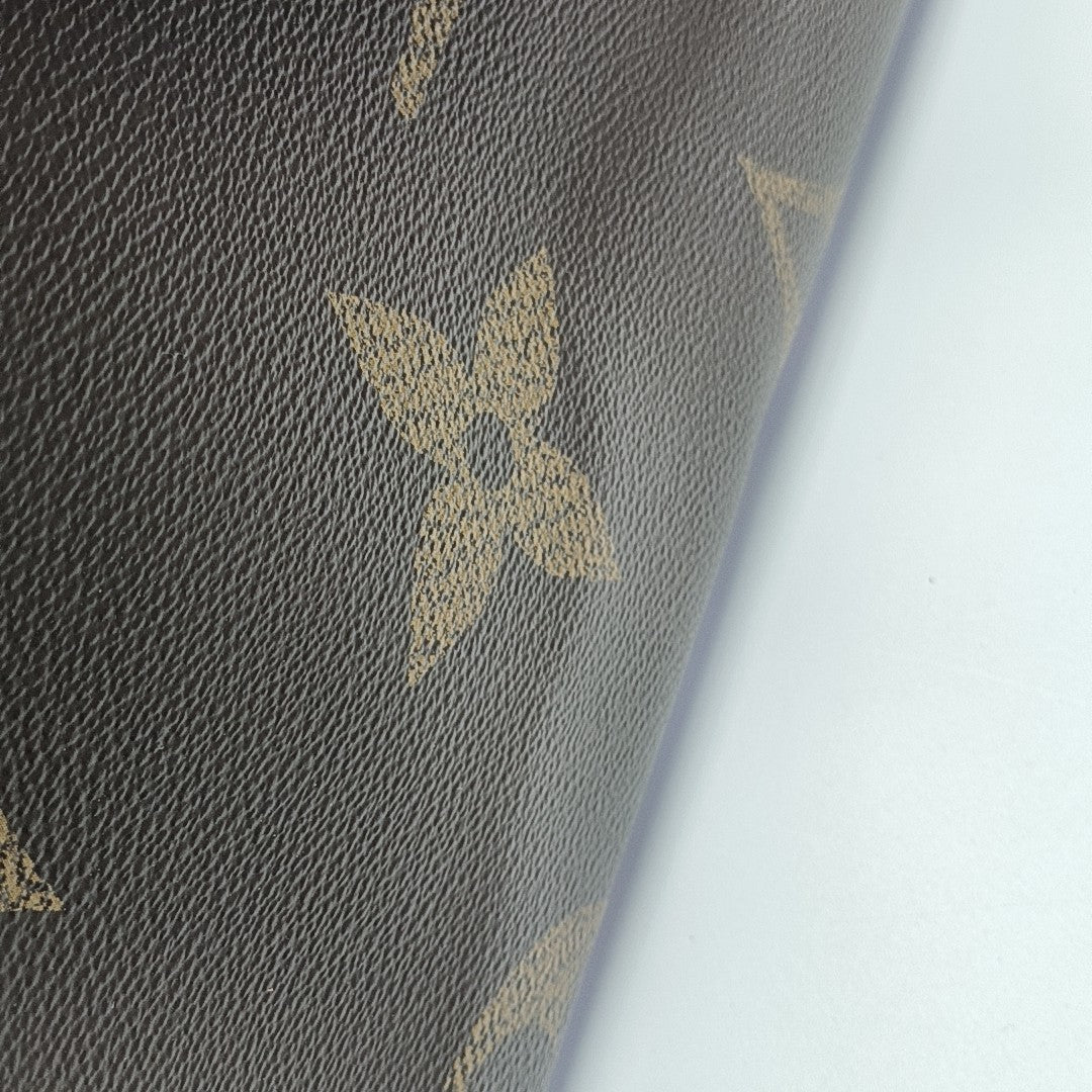 ONTHEGO MM Monogram Coated Canvas Brown