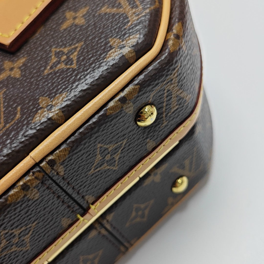 BOITE CHAPEAU PM Monogram Coated Canvas Brown