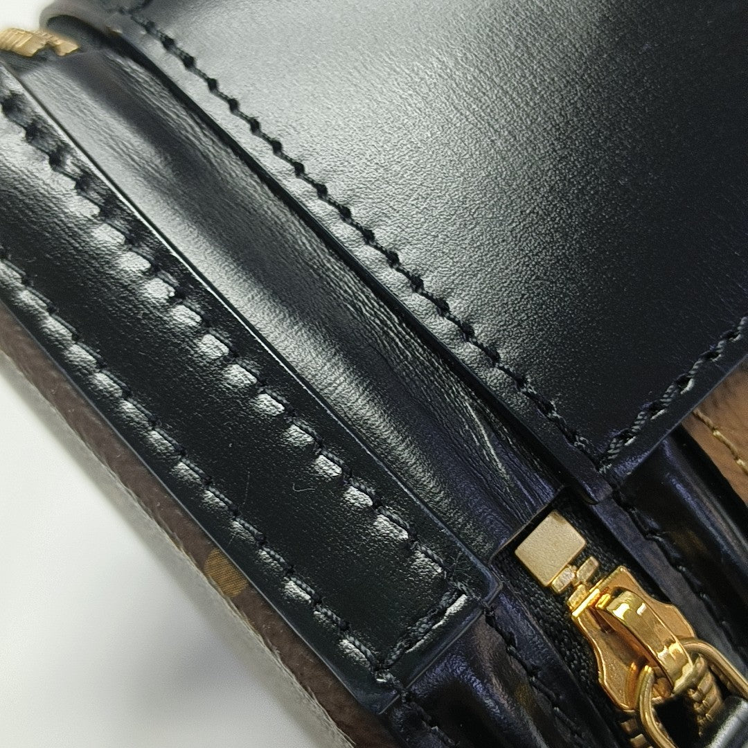 CANNES PM Monogram Coated Canvas Brown