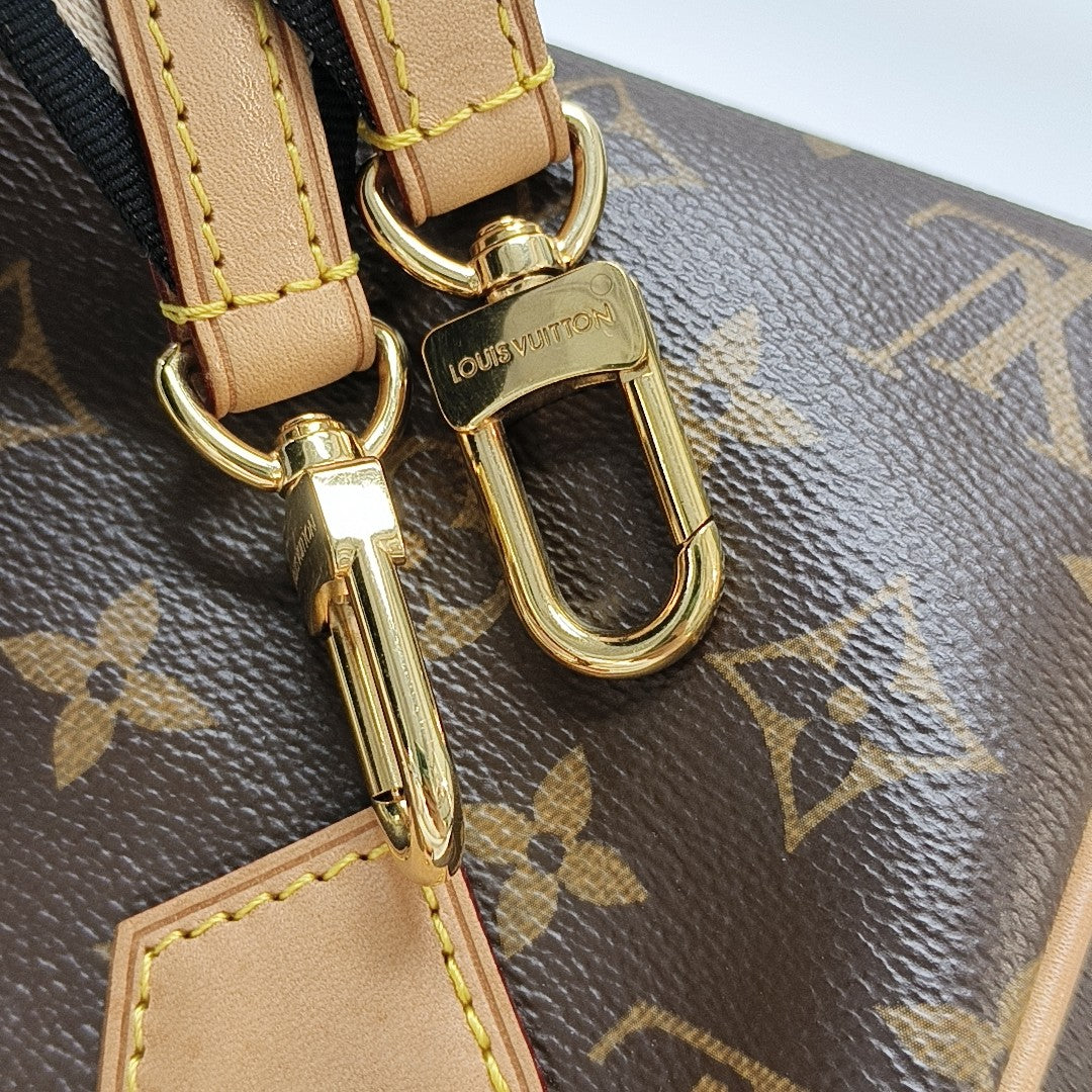 SPEEDY 20 Monogram Coated Canvas Brown