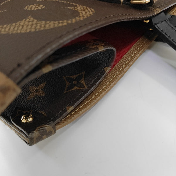 ONTHEGO GM Monogram Coated Canvas Brown