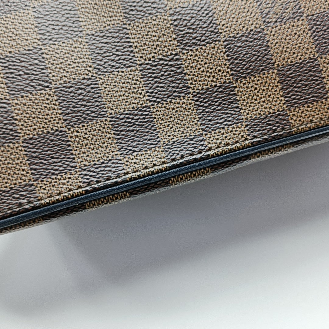 Damier Ebene Coated Canvas Brown