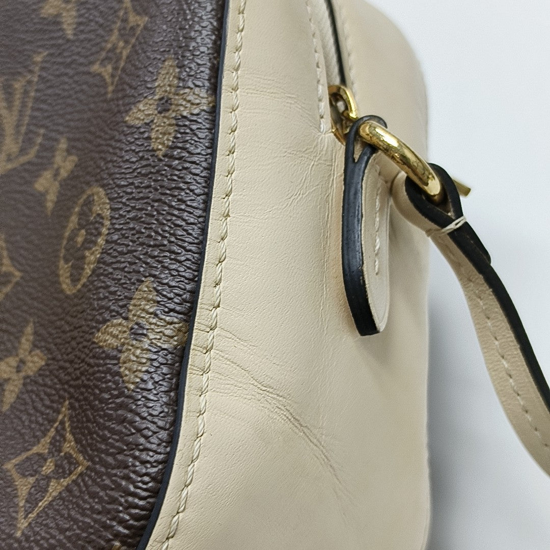 SAINTONGE Monogram Coated Canvas Brown