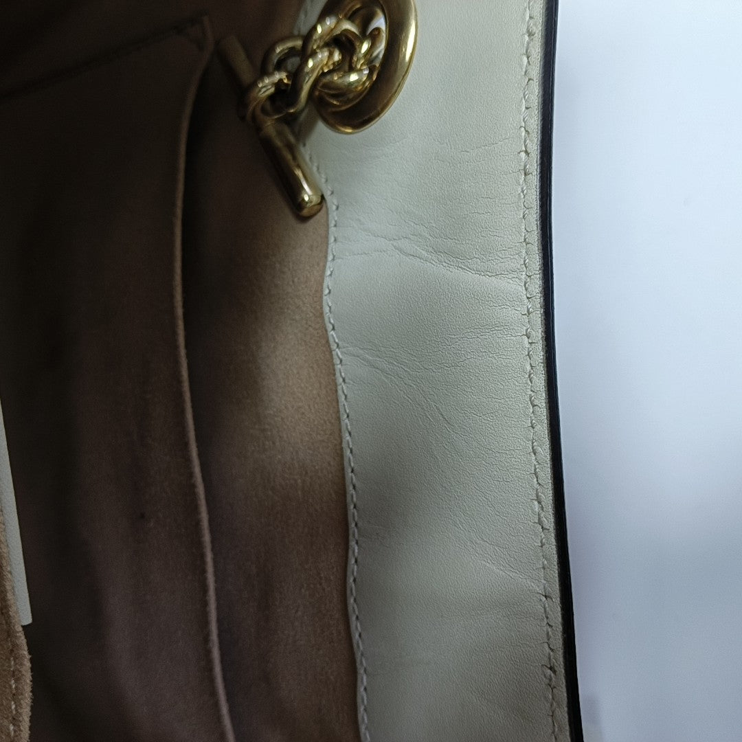 Padlock Small Monogram Coated Canvas Beige
