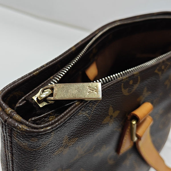 PIANO PM Monogram Coated Canvas Brown
